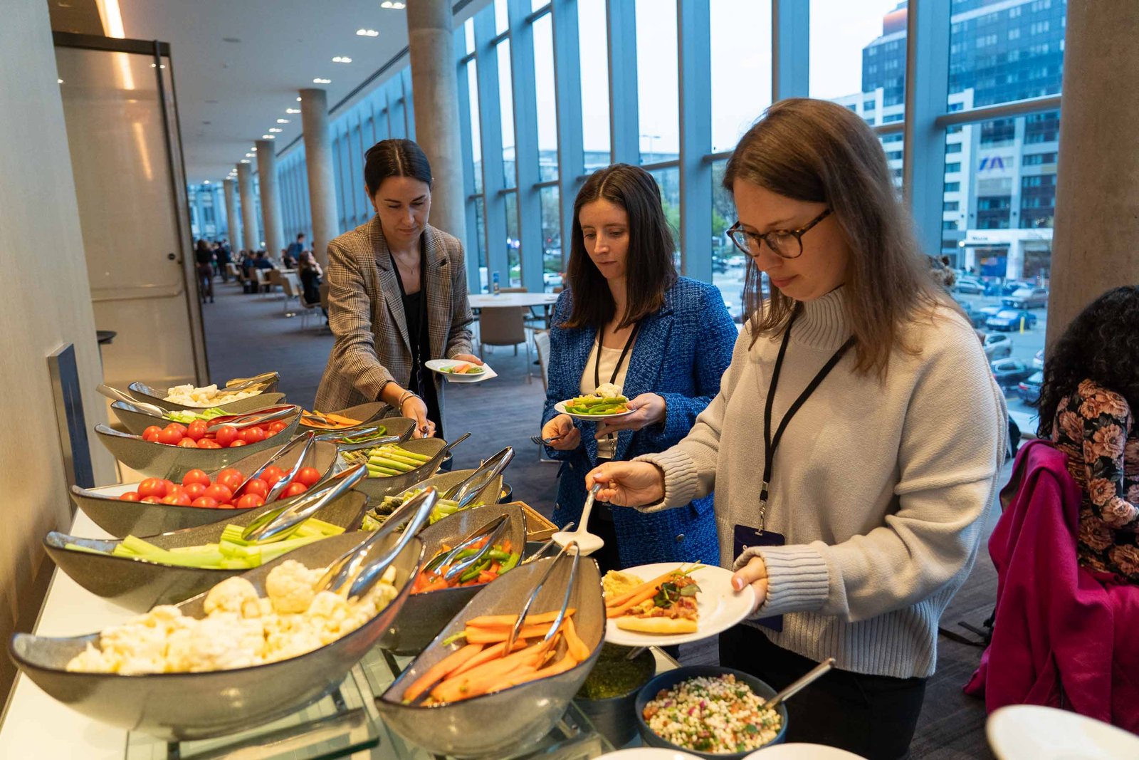 attendees getting snacks