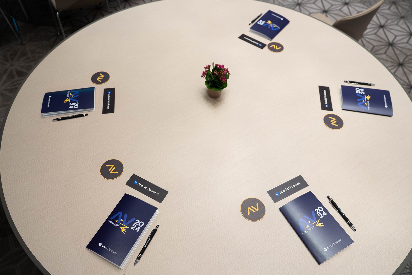 conference merch on round table