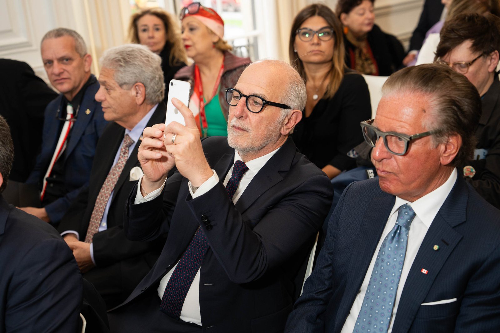 Two executives in conversation at NIAF Italian Consulate event New York City