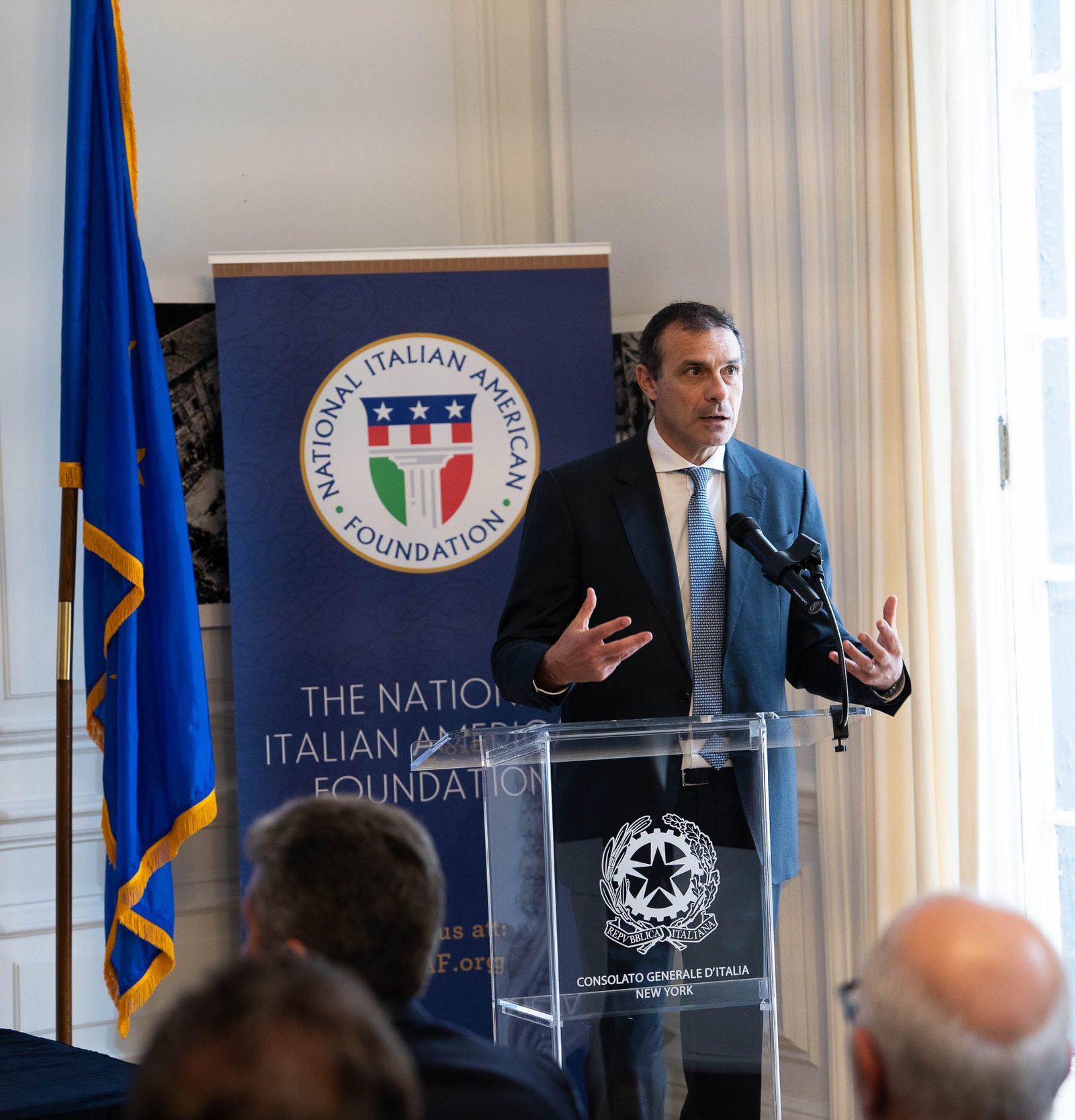 Executive speaking at NIAF podium Italian Consulate Manhattan April 2024