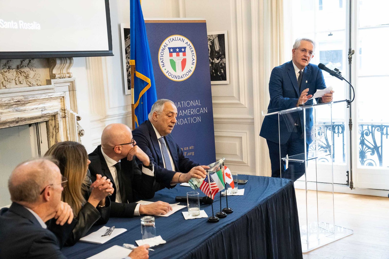NIAF panel with speakers at table Italian Consulate General Manhattan 2024