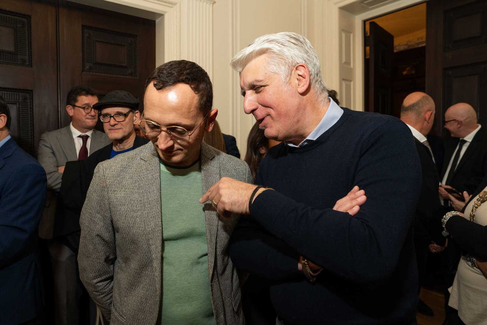 Attendees in candid conversation at NIAF Italian Consulate event Manhattan