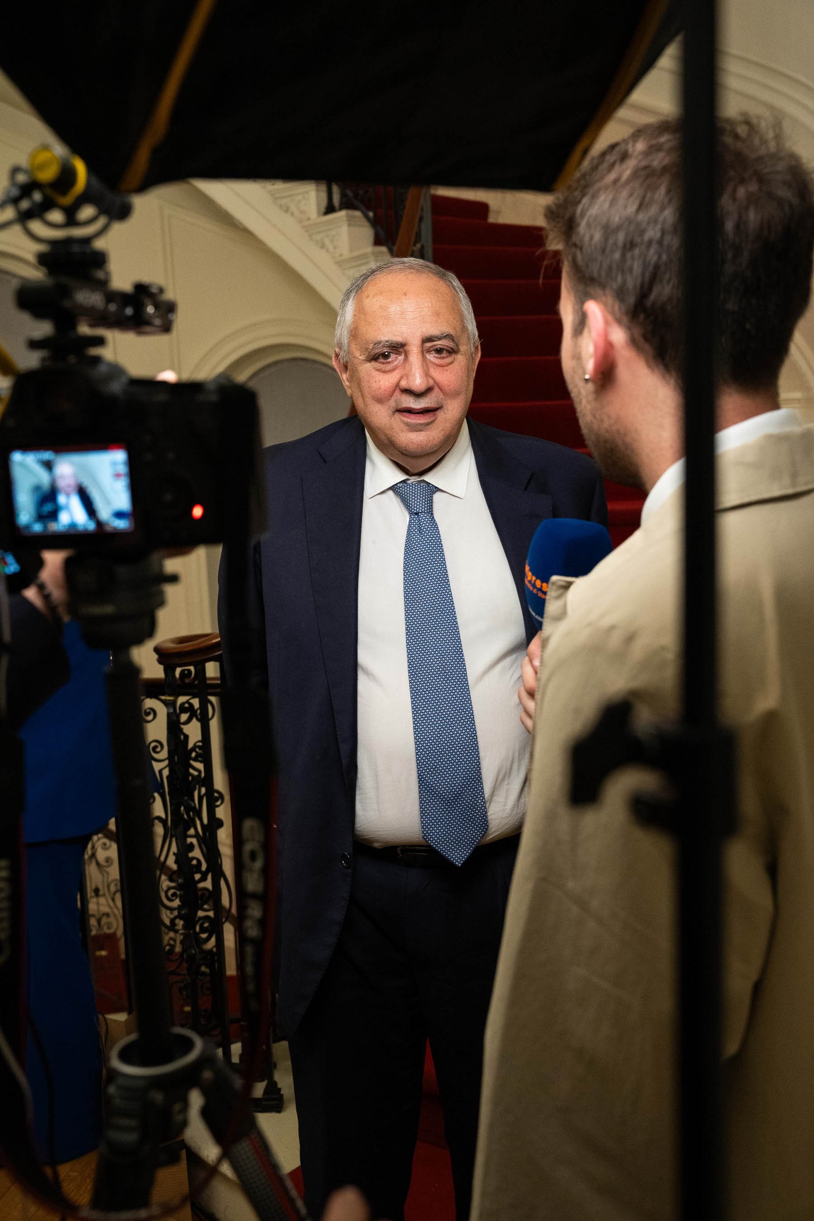 Man speaking at NIAF Italian Consulate event staircase New York City 2024