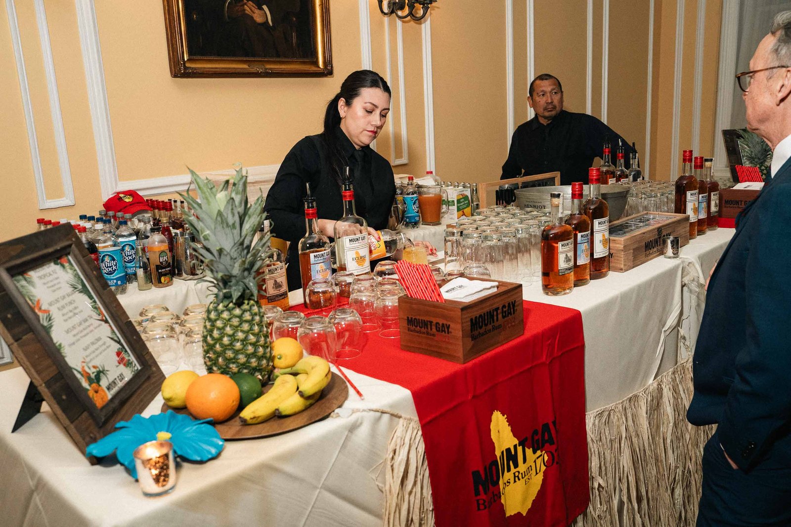 Cocktail table with spirits and decor at Sailor's Ball 2024 gala New York City