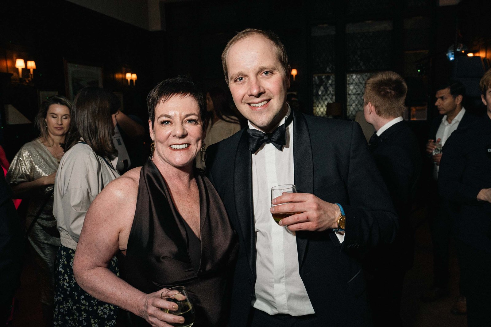 Couple sharing a moment at Sailor's Ball 2024 NYC gala