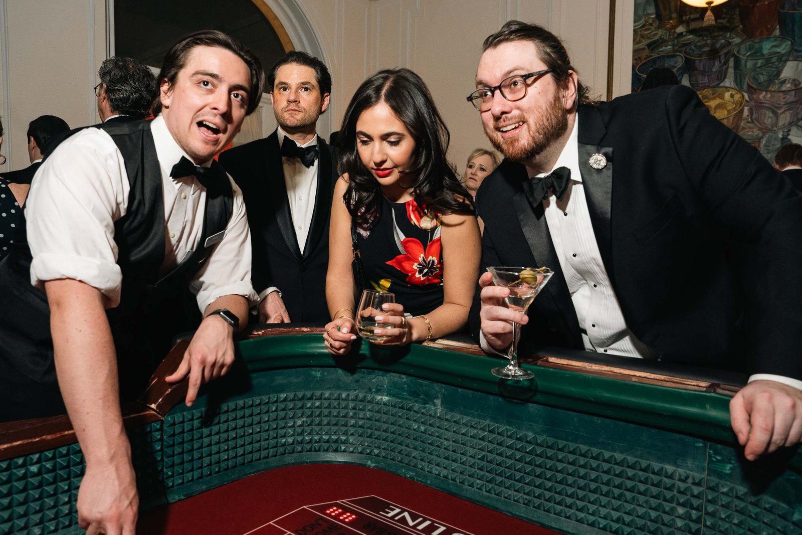 Guests at casino table at Sailor's Ball 2024 New York City gala event