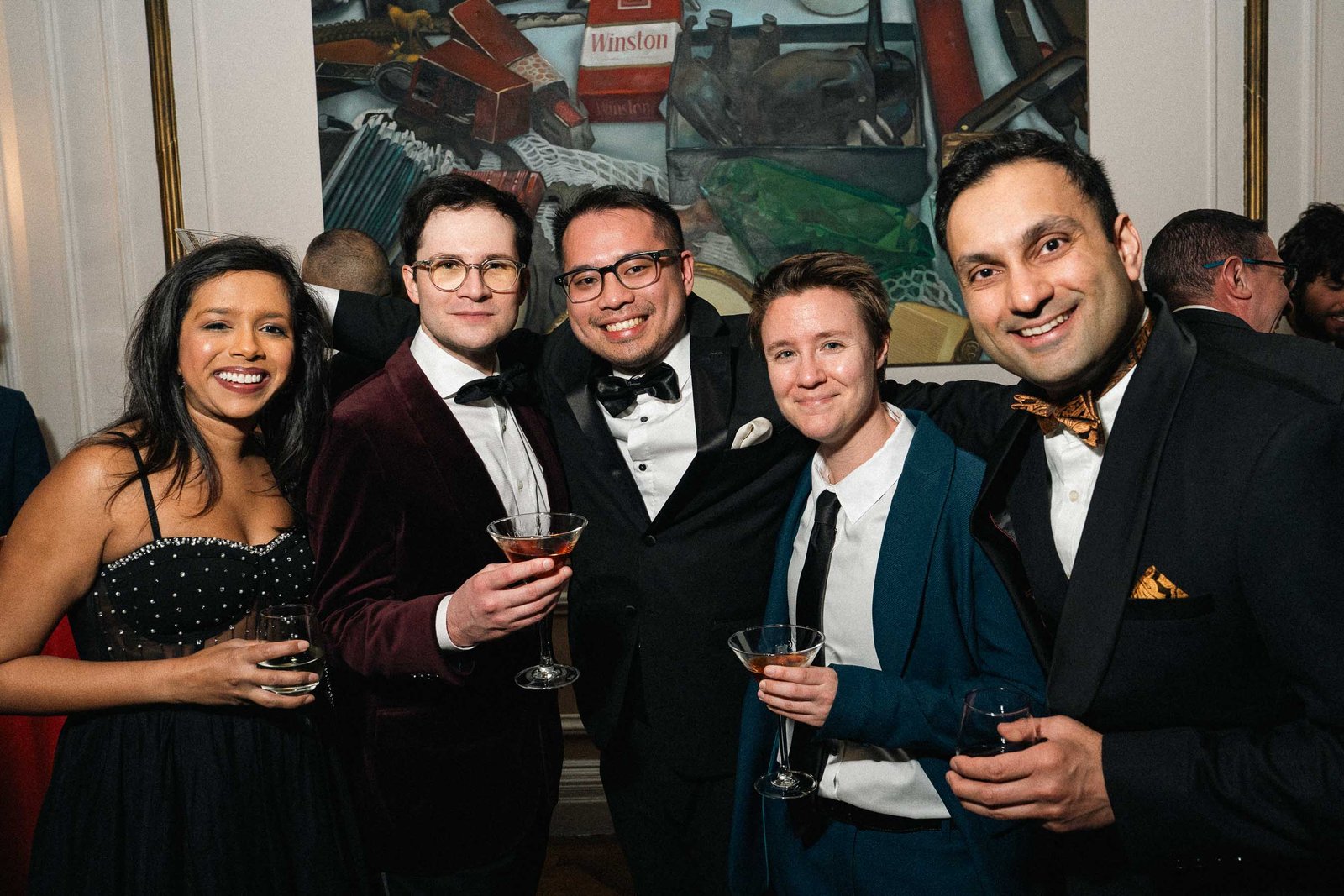 Group of guests with drinks at Sailor's Ball 2024 New York City