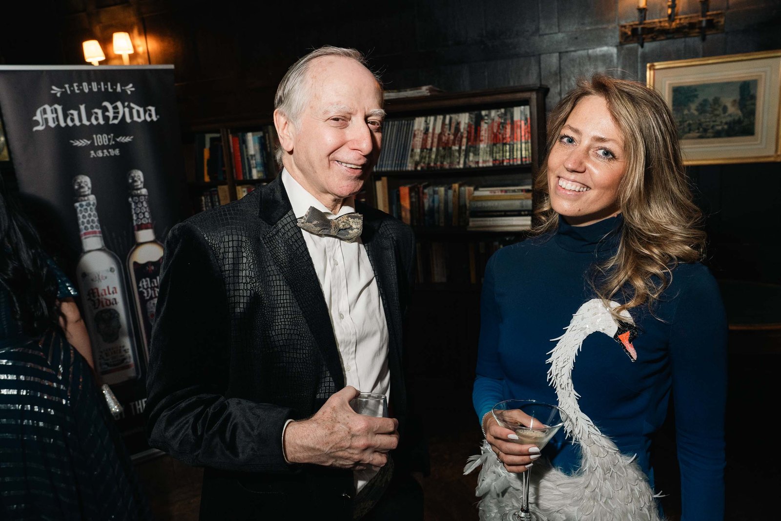 Older gentleman with woman at Sailor's Ball 2024 NYC event