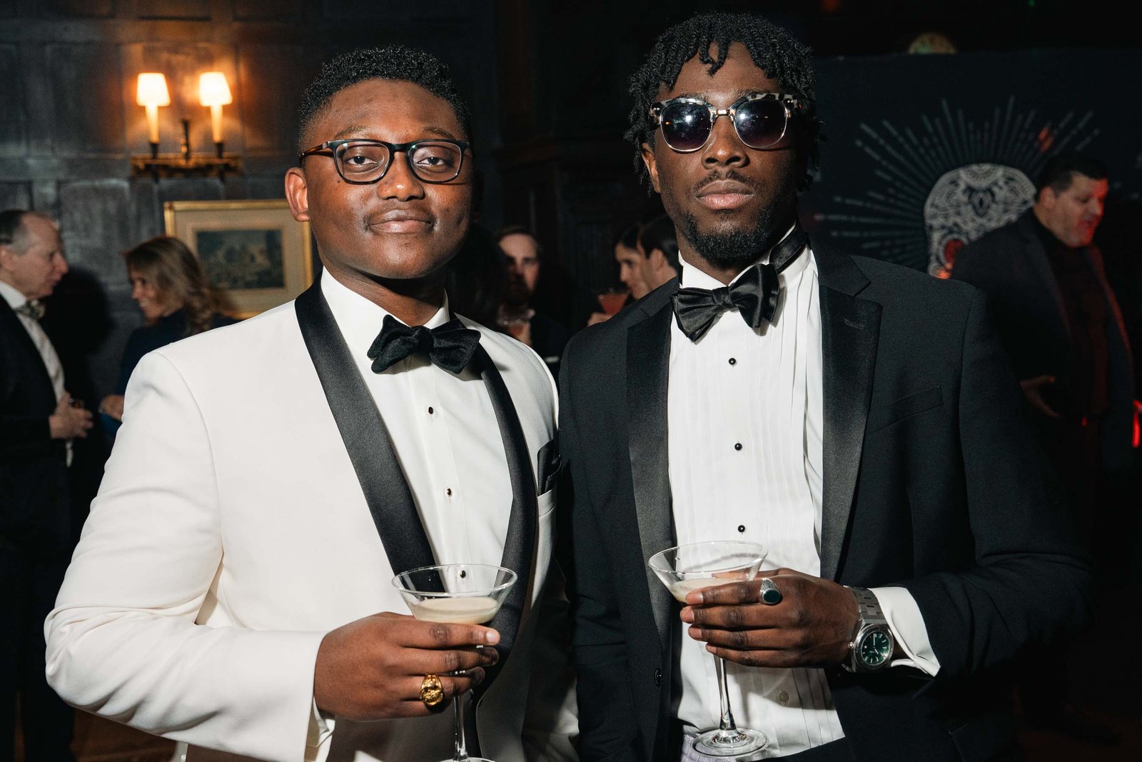 Man in white tuxedo jacket at Sailor's Ball 2024 NYC event