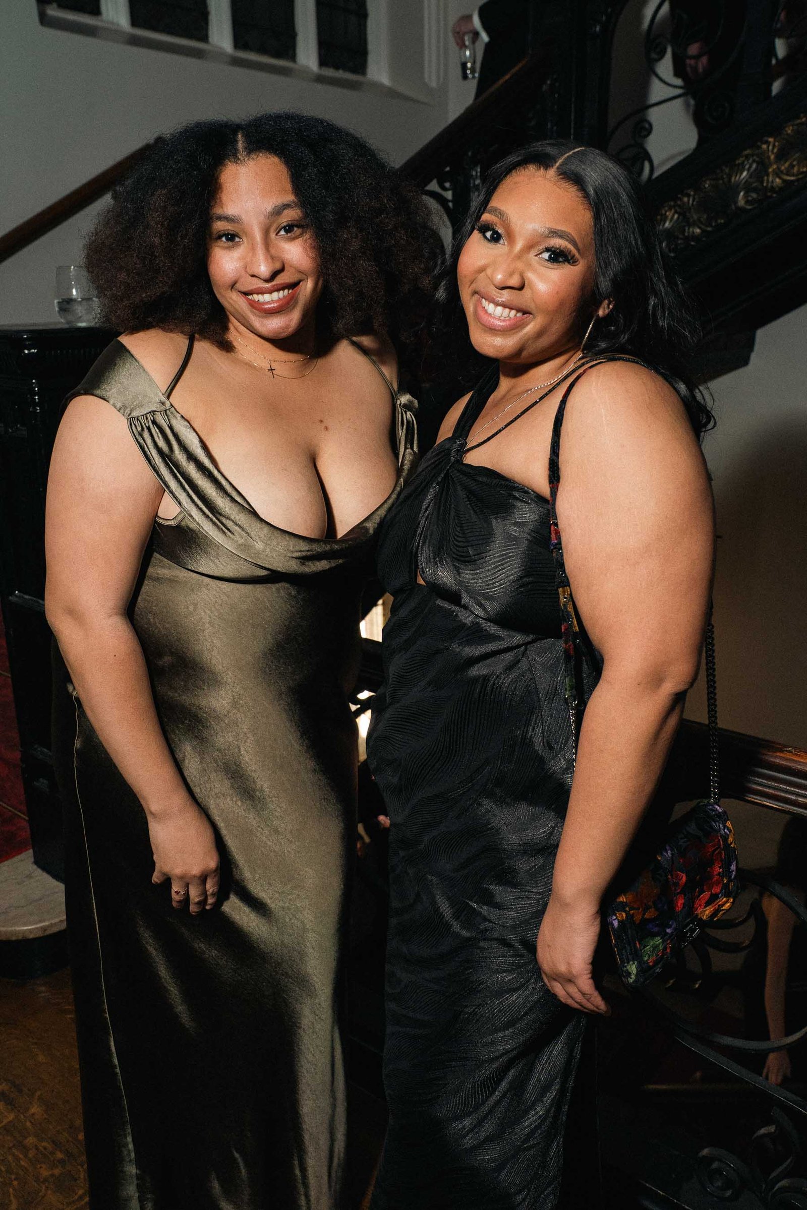 Two women in formal gowns at Sailor's Ball 2024 New York City