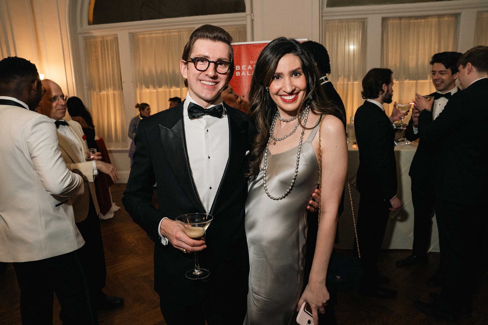 Couple smiling at Sailor's Ball 2024 New York City gala event