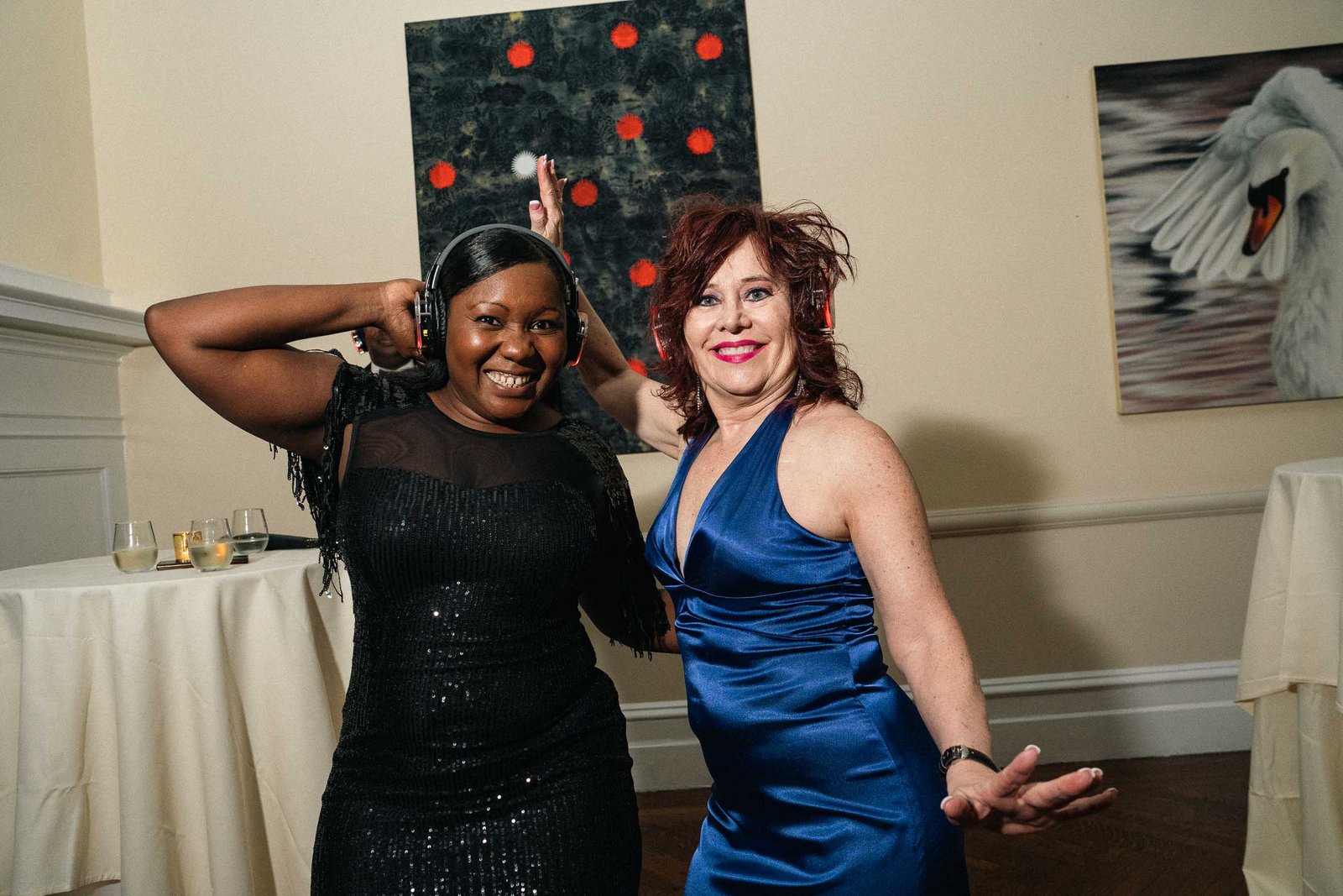 Woman in blue dress dancing at Sailor's Ball 2024 NYC gala