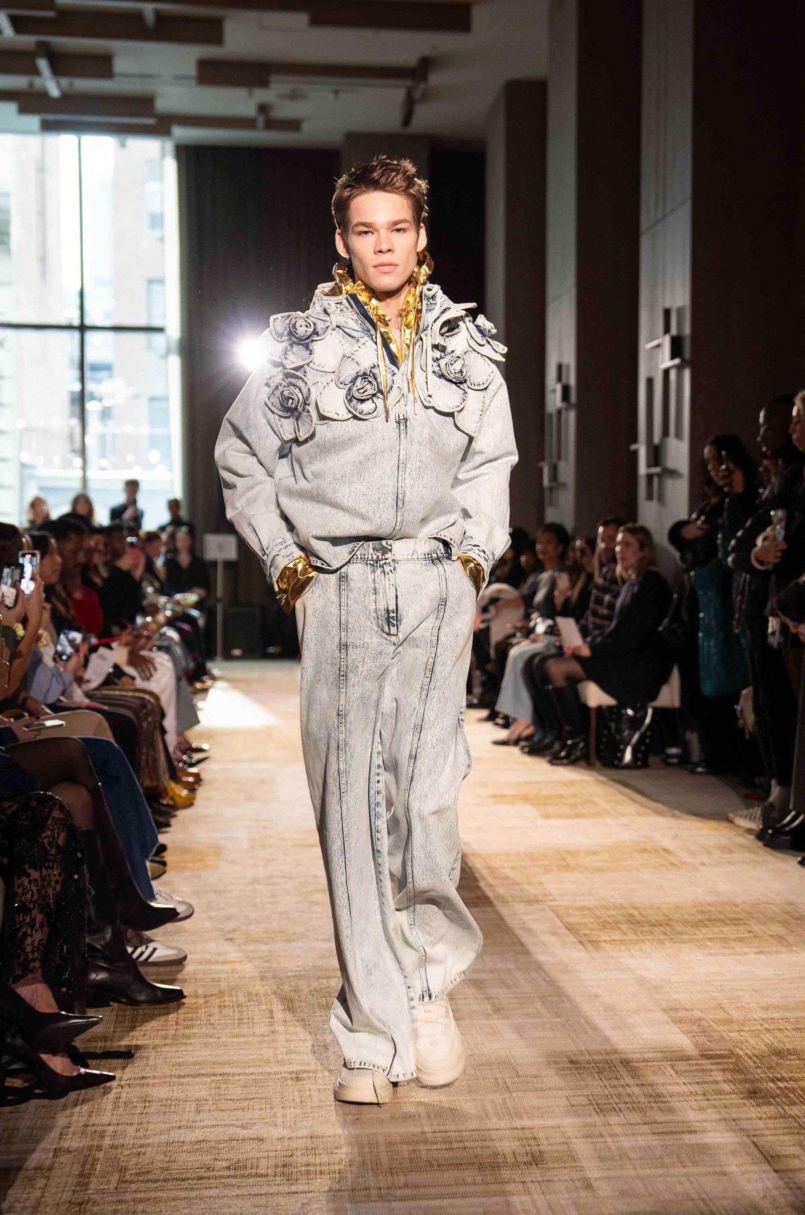 Aknvas runway model in denim outfit New York Fashion Week