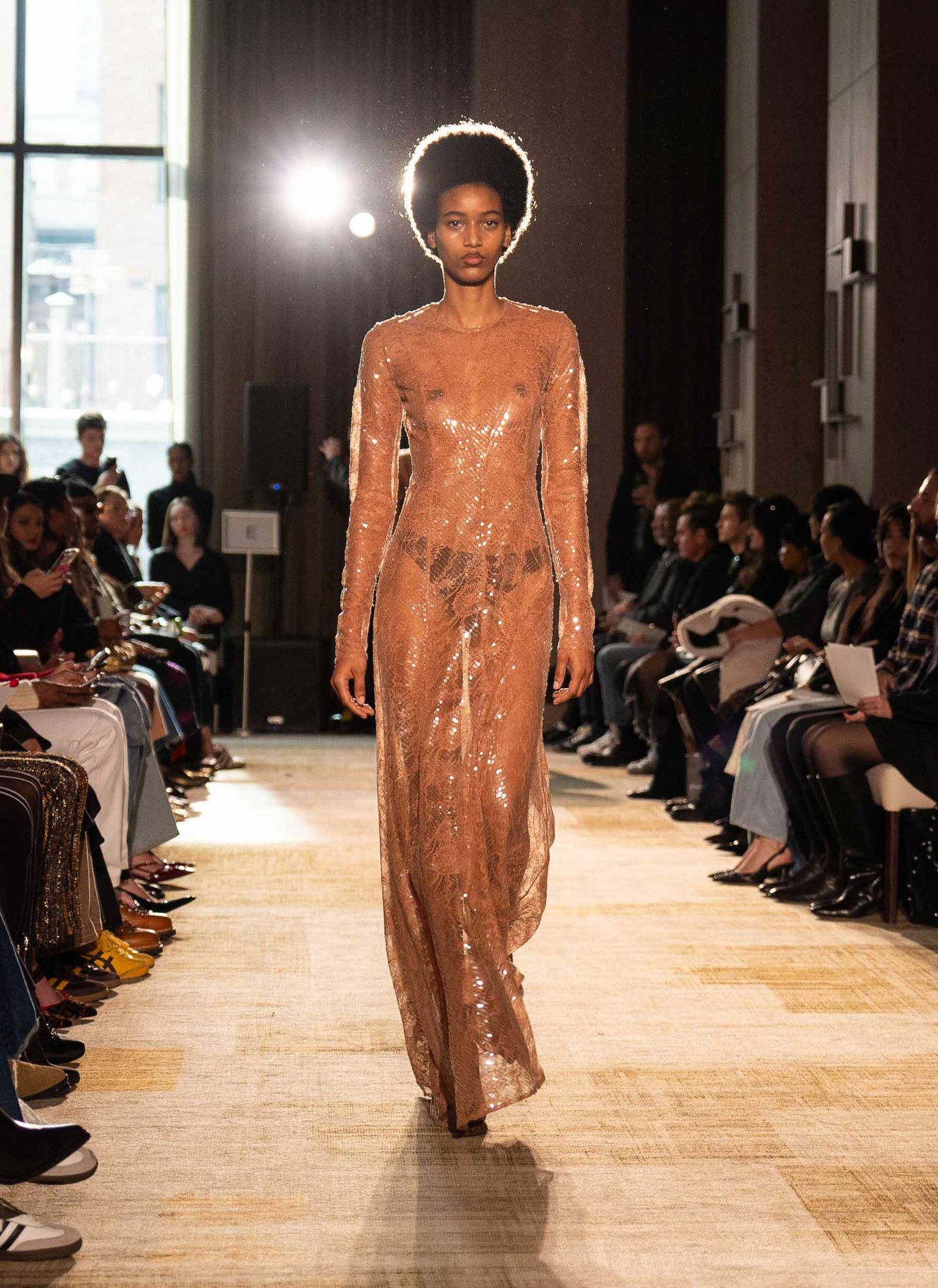 Aknvas runway model in sheer mesh outfit NYFW New York City