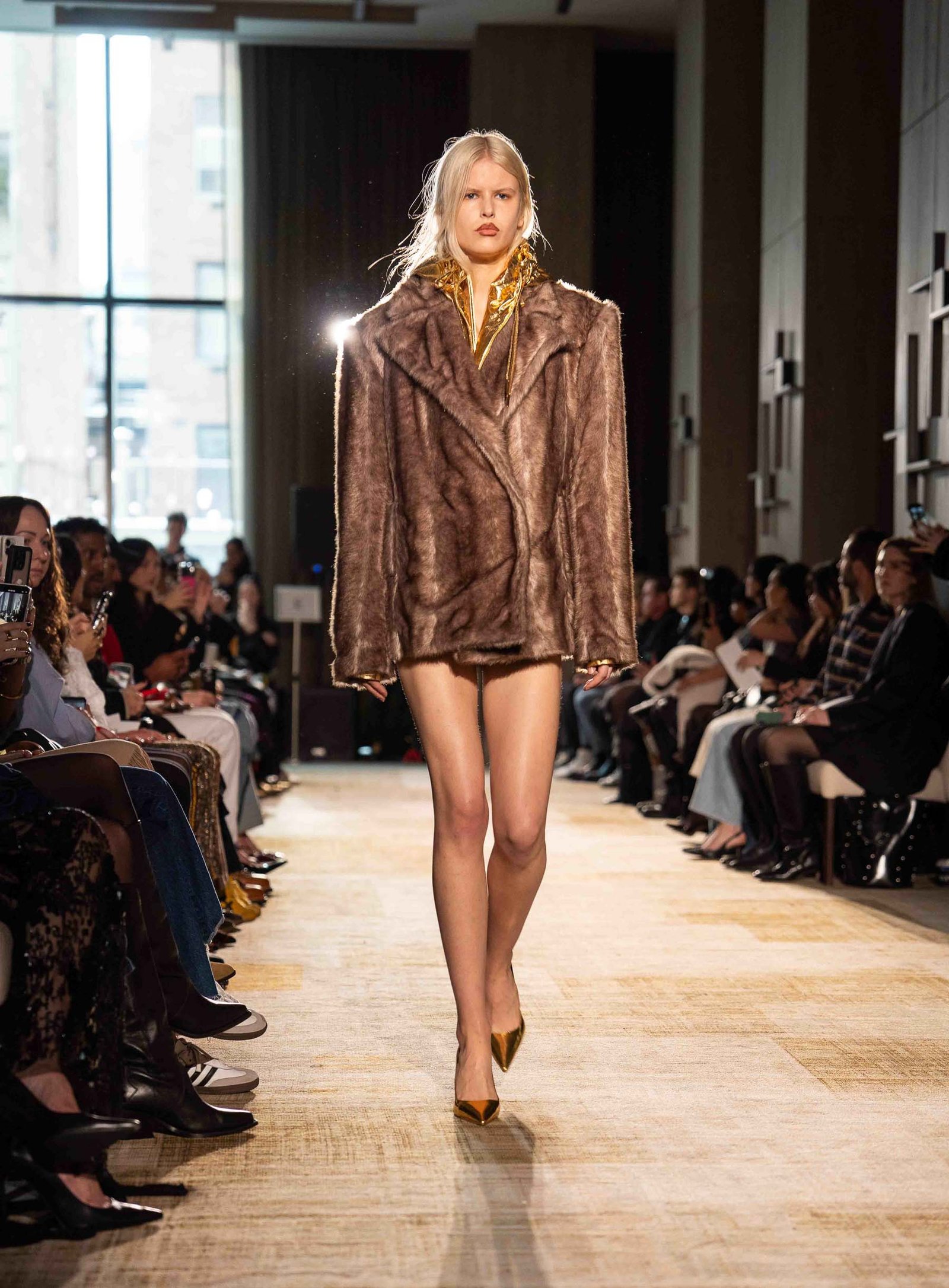 Aknvas runway model in fur coat New York Fashion Week