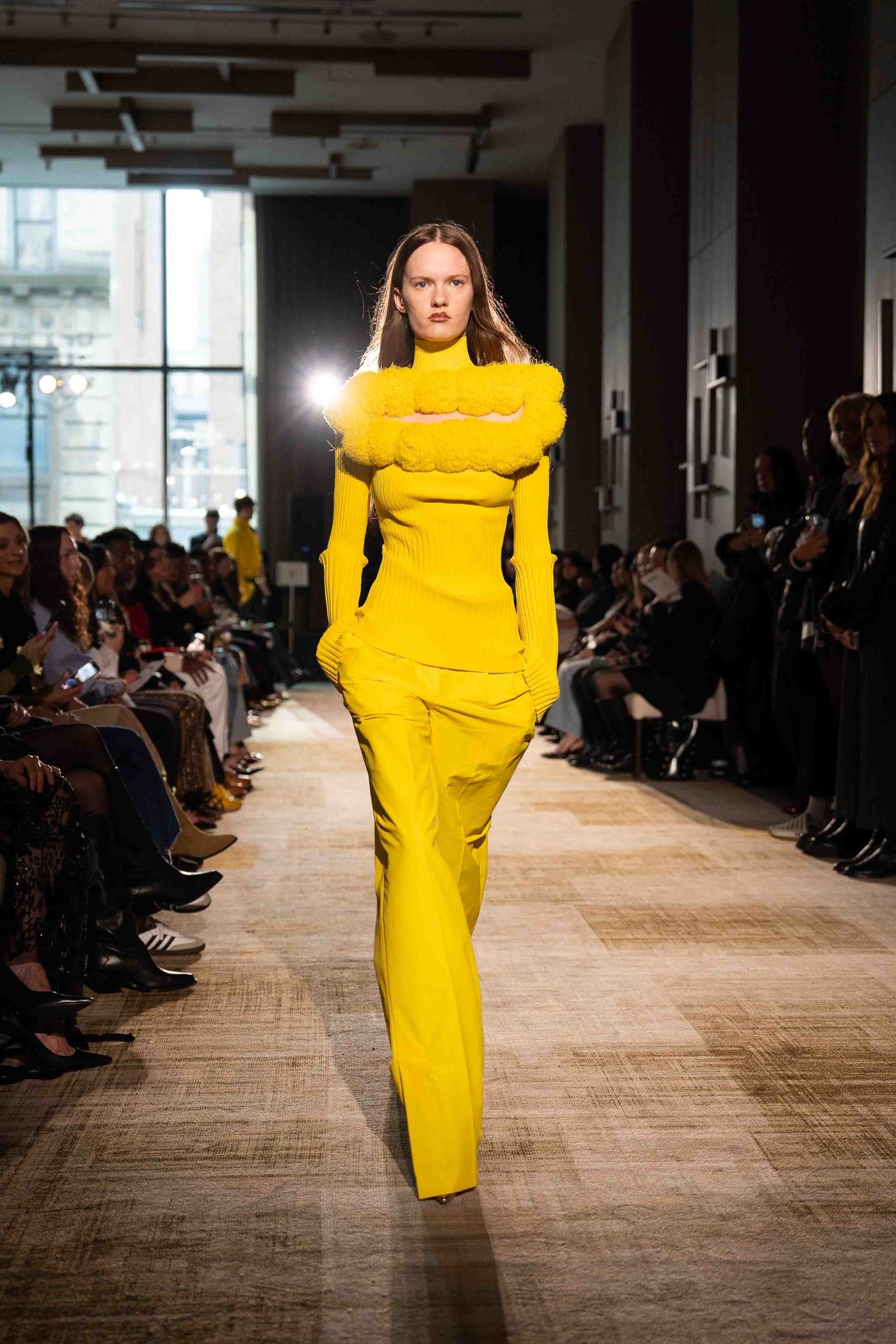 Aknvas runway model in bright yellow dress NYFW New York City